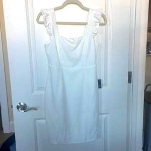 Never-been-worn white mini-dress with tags still on. Great for brides!